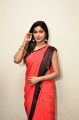 Actress Sai Akshatha Hot in Sleeveless Black Blouse & Red Saree Pics