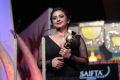 Divya Dutta receiving Best Supporting Actor at the SAIFTA award ceremony