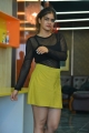 Actress Sanjana Anand Photos in Black Net Top and Yellow Mini Skirt