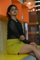 Actress Sanjana Anand Photos in Black Net Top and Yellow Mini Skirt