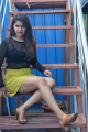 Actress Sanjana Anand Photos in Black Net Top and Yellow Mini Skirt