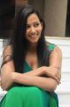 Actress Sanjana Singh Spicy Hot Stills in Long Green Dress