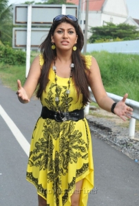 Hot Sarah Sharma in Yellow Mini Frocks