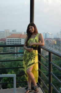 Hot Sarah Sharma in Yellow Mini Frocks