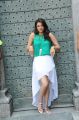 Actress Kajal Agarwal Hot Images in Bright Cyan Top & White Skirt