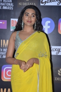 Actress Shivathmika Rajashekar Yellow Saree Photos @ SIIMA 2021