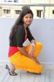 Telugu Actress Sravani Stills in Red Top & Yellow Pant
