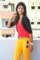 Telugu Actress Sravani Stills in Red Top & Yellow Pant