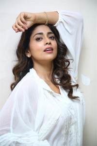 Gamanam Actress Shriya Saran Latest Stills in White Shirt & Blue Jeans