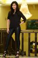 Actress Shruti Hassan in Black Relaxed Shirt & Tight Leather Pants