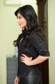 Actress Shruti Hassan in Black Shirt & Leather Pants Photos