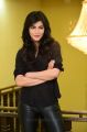 Actress Shruti Hassan in Black Shirt & Leather Jeans Photos