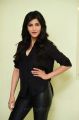 Actress Shruti Hassan in Black Relaxed Shirt & Tight Leather Pants