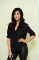 Actress Shruti Hassan in Black Relaxed Shirt & Tight Leather Pants