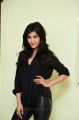 Actress Shruti Hassan in Black Relaxed Shirt & Tight Leather Pants