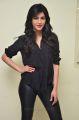 Actress Shruti Hassan in Black Relaxed Shirt & Tight Leather Pants