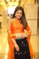 Jambalakidi Pamba Actress Siddhi Idnani Images in Orange Dress