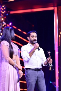 Anoop Sathyan won Best Debutant Director award for Varane Avashyamund movie @ SIIMA Awards 2021