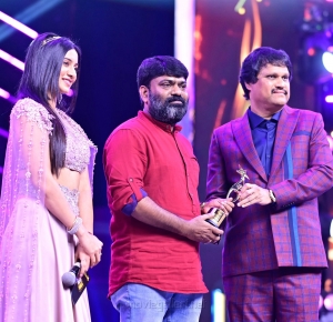 Karuna Kumar won Best Debutant Director (Telugu) award for Palasa 1978 movie @ SIIMA Awards 2021