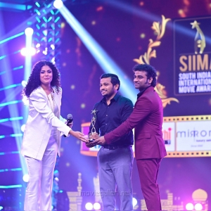 Actor-Basil-Joseph-winning-the-Best-Actor-In-A-Comedy-Role-Malayalam-award-for-the-Kettiyolaanu-Ente-Malakha-movie-@-SIIMA-Awards-2021