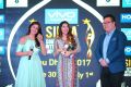 Nikki Galrani & Vivek Zhang presenting VIVO Best Actress Award to Nakshatra