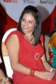 Singer Madhoo Hot Stills in Red Dress