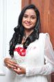 Telugu Actress Sravani Cute Stills in White Salwar Kameez