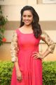 Actress Sree Divya in Red Long Dress Photos