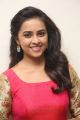 Actress Sree Divya in Red Long Dress Photos