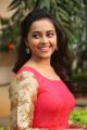 Actress Sri Divya Hot in Red Long Dress Photos