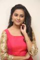 Actress Sri Divya in Red Long Dress Photos