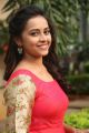 Actress Sri Divya in Red Long Dress Photos