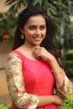 Actress Sri Divya in Red Long Dress Photos