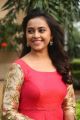 Tamil Actress Sri Divya in Red Long Dress Photos