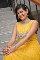 Actress Swetha Jadhav Pictures in Yellow Long Gown