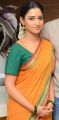 Actress Tamanna Stills in Yellow Saree @ Abhinetri First Look Launch