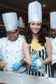 Actress Tamanna Cute Pics at Cake Mixing in Taj Banjara Hotel