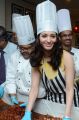 Tamanna participates in Cake Mixing at Taj Banjara, Hyderabad