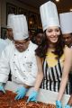 Actress Tamanna participates in Cake Mixing at Taj Banjara, Hyderabad