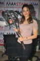 Actress Tamanna at Racha Axe Auction Stills