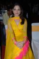 Milky White Beauty Tamanna New Cute Photos in Yellow Salwar Kameez