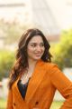 Actress Tamanna Pics in Dark Orange Suit @ Next Enti Movie Interview