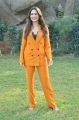 Actress Tamannaah Bhatia Pics in Dark Orange Suit @ Next Enti Movie Interview