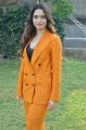 Actress Tamanna Pics in Dark Orange Suit @ Next Enti Movie Interview