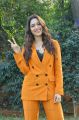 Actress Tamanna Pics in Dark Orange Suit @ Next Enti Movie Interview