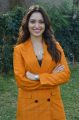 Next Enti Movie Actress Tamannaah Bhatia Pics in Dark Orange Suit
