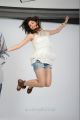 Tanvi Vyas Photo Shoot Stills in White Top & Jean Shorts Dress