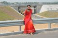 Tapsee on National Highway in Hot Red Saree