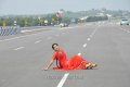 Tapsee on National Highway in Hot Red Saree