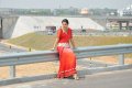 Tapsee on National Highway in Hot Red Saree